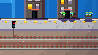 Rail yard: a freight train rolling in past the signals below the street
